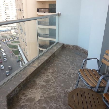 Hilton Alexandria Corniche Hotel Ngoại thất bức ảnh A balcony in a residential building in Cairo, Egypt